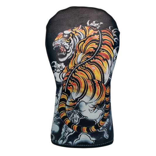 The Birdie Workshop faux leather golf headcover featuring a vibrant tiger sublimation print and black fleece lining.