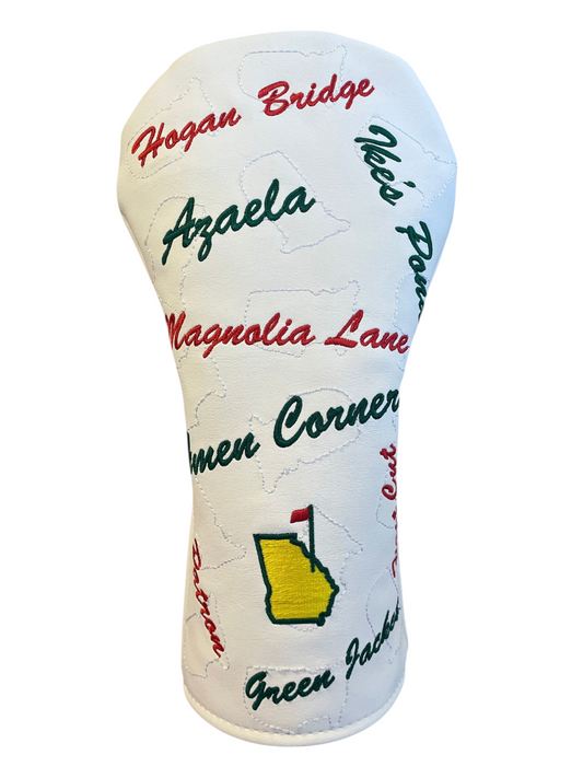 The Birdie Workshop white faux leather golf driver cover with embroidered Masters-inspired tournament sayings